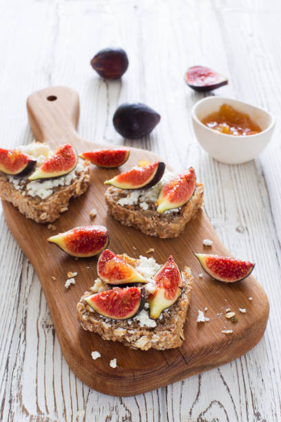 istock Open sandwiches with soft cheese and figs 1172574516