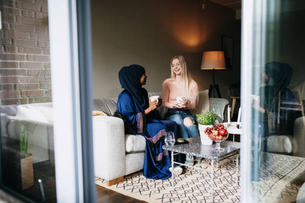 istock Generation Z women drinking coffee and chatting 1172575687