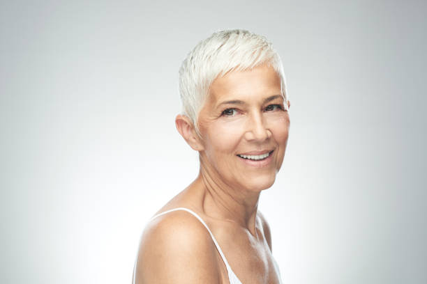 istock Senior woman posing in studio. 1172575877