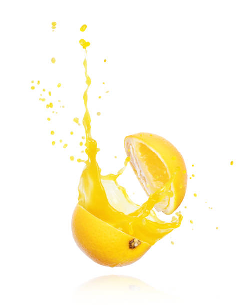 istock Juice splashes out of a cut orange, isolated on white background 1172577034