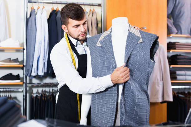 istock Handsome male tailor  working  in atelier 1172577265