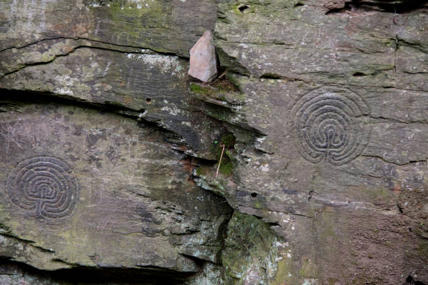 istock Two ancient petroglyphs in rocks near Tintagel, Cornwall 1172578951