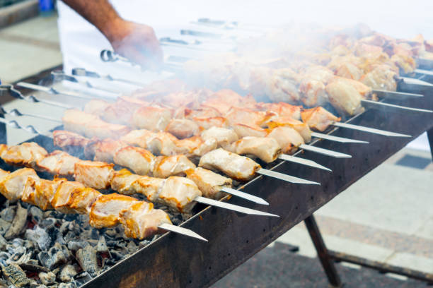 istock cooking roast pork on coals 1172585651
