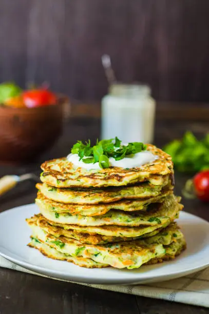 zucchini fritters with carrot, parsley and green onion