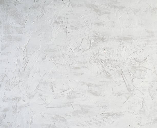istock fragment of a cement background from white and gray paint with cracks 1172589912