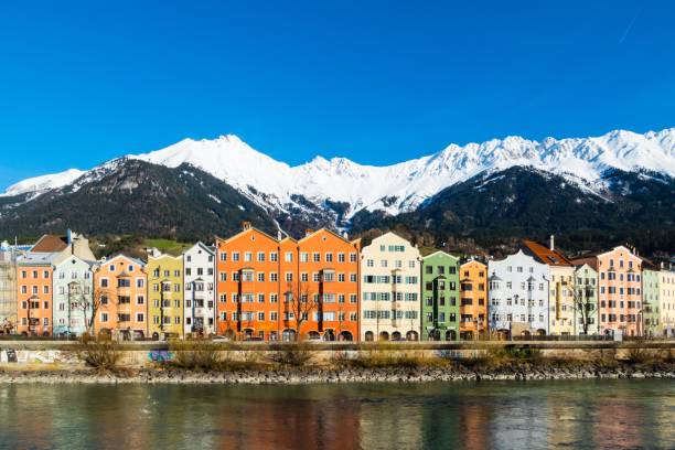 Colorful Houses of Innsbruck on River Inn European Alps Austria inn river stock pictures, royalty-free photos & images