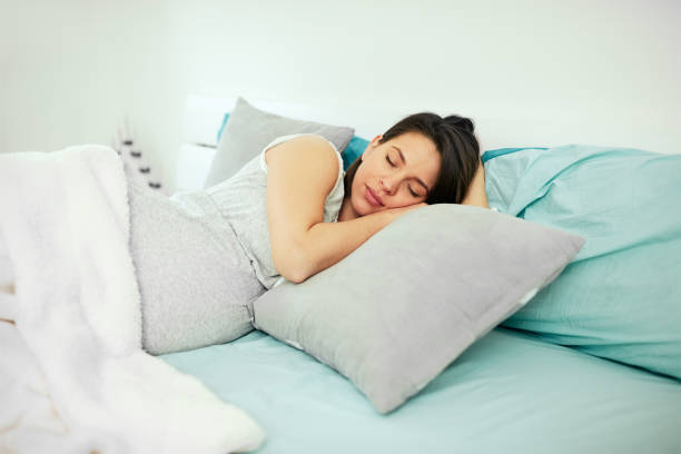 istock Pregnant woman sleeping. 1172592992