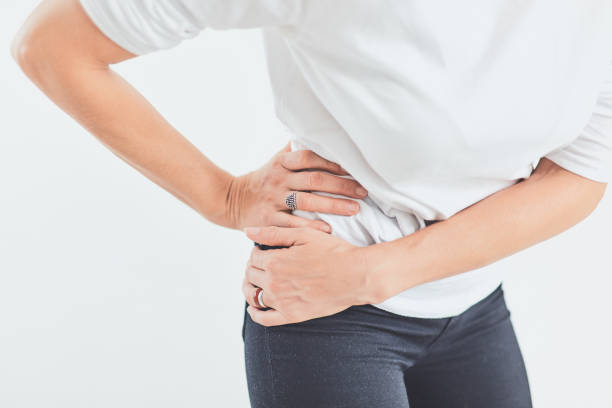 成人年�齢における股関節、背中および脊髄の問題。 - arthritis osteoporosis pain backache ストックフォトと画像