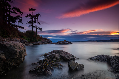Sunset at the popular seaside viewpoint of Saxe Point in Victoria,BC