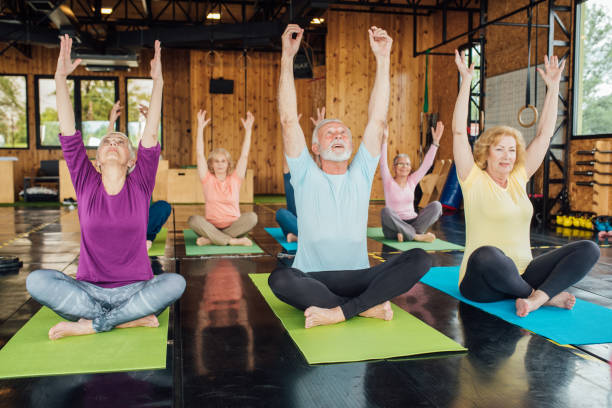 istock Group of seniors staying active with yoga 1172601173