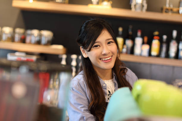 istock Barista in coffee shop 1172602844