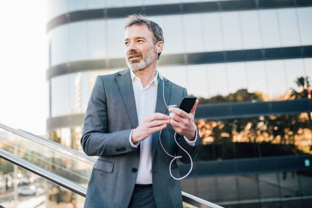 istock Older guy listening to music 1172604293