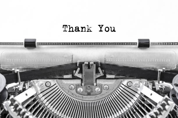 istock Vintage typewriter on white background with typed text thank you. 1172608973