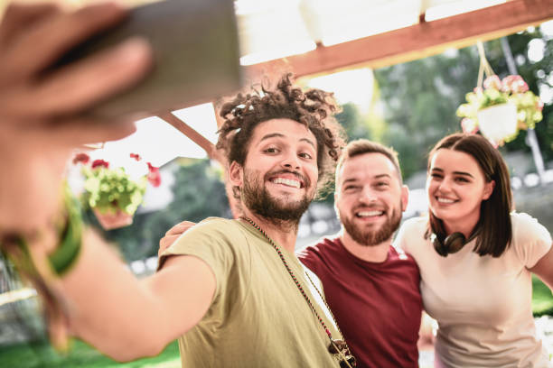 istock Rastafarian And His Friends Taking A Selfie 1172610091