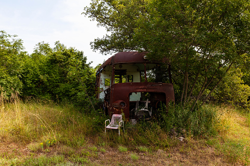 Rusty van abandoned in the countryside