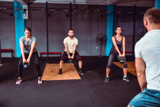istock Kettlebell Exercises By Young Sports Team 1172612209