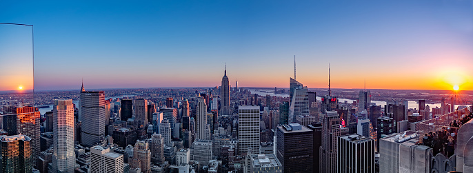 New York City, USA - April 11, 2019: Tourists are enjoying the view of Manhattan downtown skyline at dusk,New York City, USA.