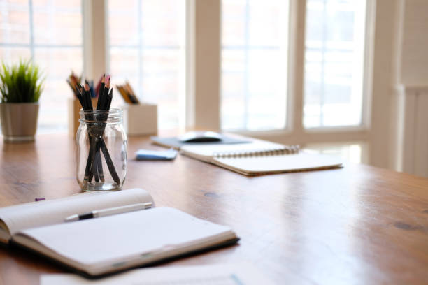 istock notebook stationary on library desk. back to school learning education concept 1172613003