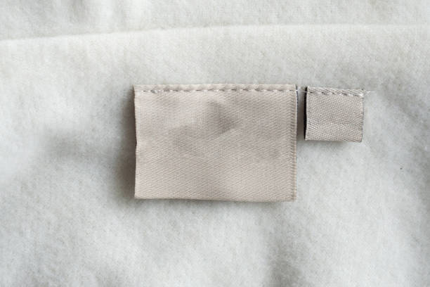 istock laundry care clothing label on fabric texture 1172620788