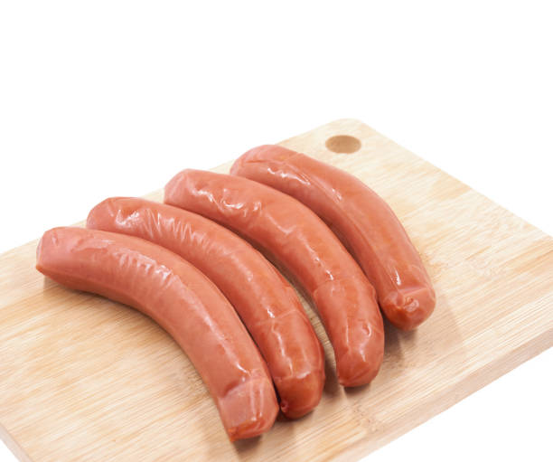 istock Stack of smoked sausages isolated on a white background 1172620999
