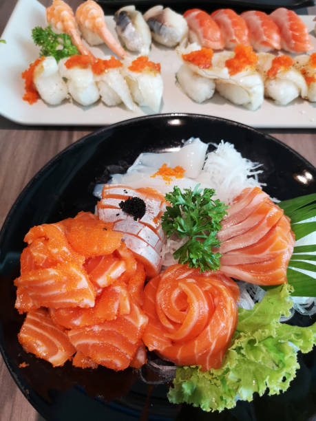 istock Close up slice of salmon sashimi 1172625825