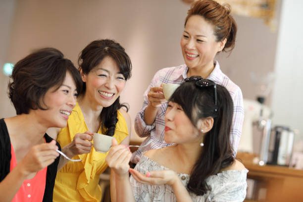 istock Women enjoying dessert in cafe 1172627084