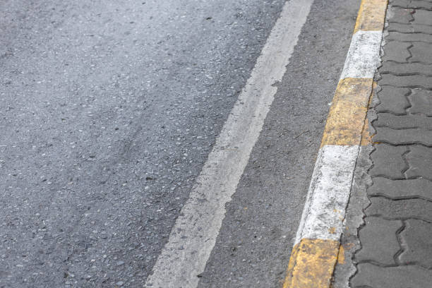 istock Yellow and white lines on the footpath 1172627385