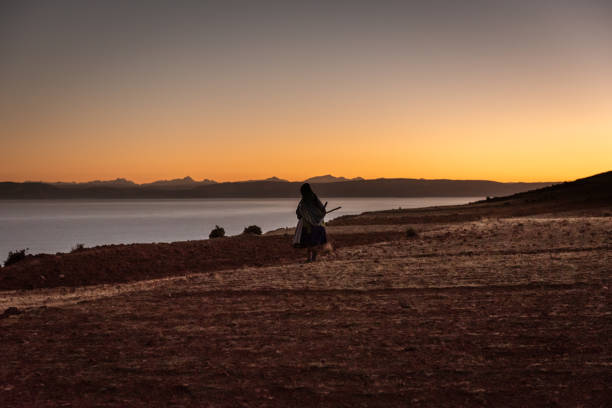 istock Peruvian woman walking down the hill 1172628290