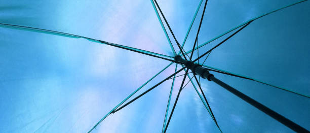 istock close up of under a blue umbrella 1172629303