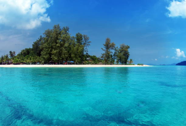 istock blue sea and the island with white sand beach 1172631895