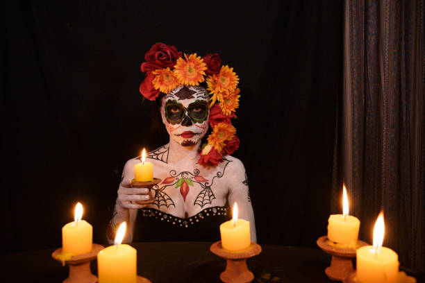 istock day of the death ghost holding candle light 1172636201