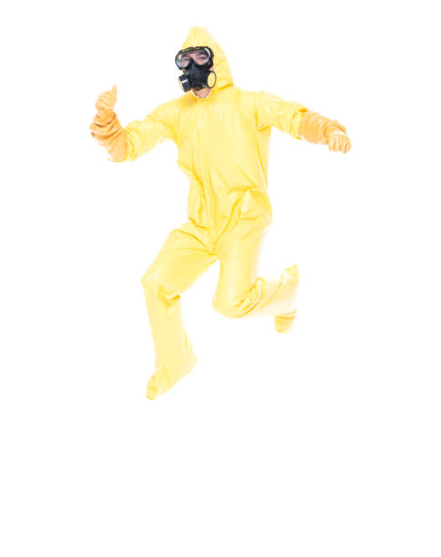 istock Man in yellow suit jumping 1172638246