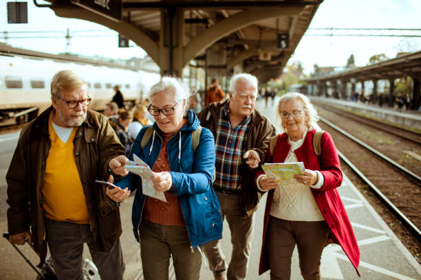 istock Seniors at a Train station 1172639173