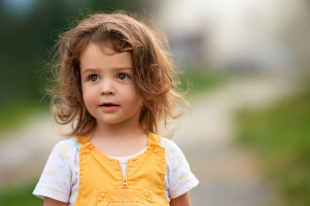istock Cute girl looking up 1172643692