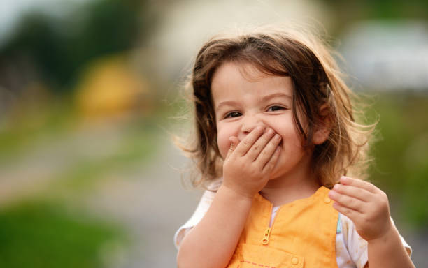 istock Hihi! Little girl laughing 1172644005