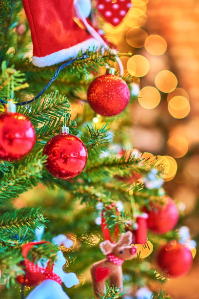 istock Christmas tree with gifts and decorations 2020 1172646050