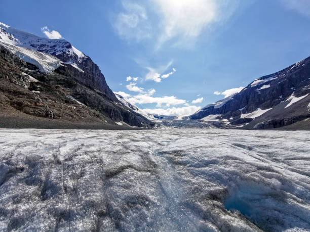 Athabasca Glacier and Mount Andromeda (seen on the left) are part of the Columbia Icefield, the largest ice field in the Rocky Mountains. The Columbia Icefield is located in the Canadian Rockies, in Jasper National Park, Alberta, Canada.