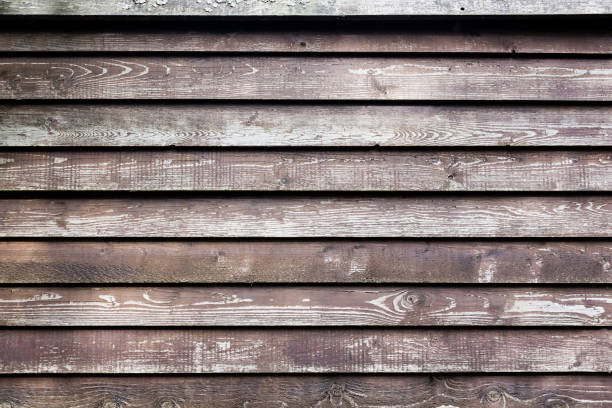 istock Old wooden background with horizontal brown boards. 1172648903