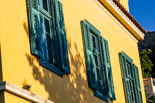 View of colorful window on a facade of a building in the Plaka neighborhood in Athens