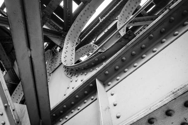 The heavy metal railway bridge black and white background texture.