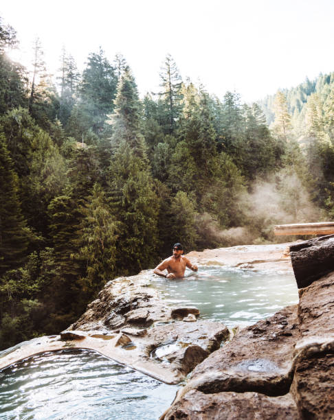 istock man resting in an hot spring in oregon 1172661080
