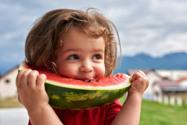 istock Eating this tasty watermelon 1172663433
