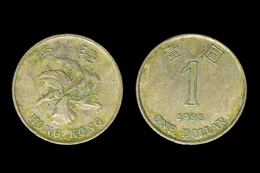 Hong Kong old coins isolated on black background,1995