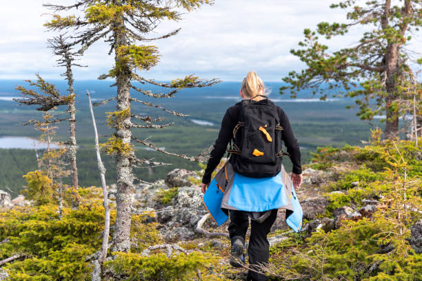 istock Woman hiking on mountain 1172665551