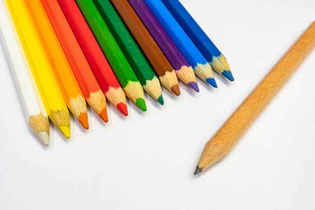 istock close up multi coloured pencils on white background. 1172669061