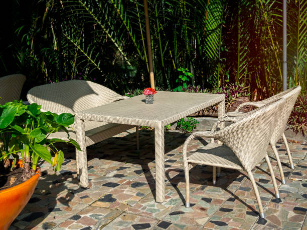 istock White rattan dining table furniture set. 1172669934