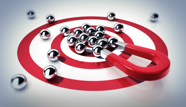 istock Magnet attracting steel balls 1172673734