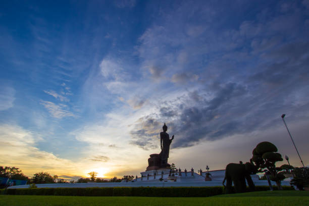 istock Sunset sky and Buddha statue at  Phutthamonthon,a Buddhist park in Nakhon Pathom Province of Thailand. 1172675257