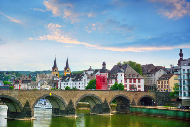 Baldwin Bridge in Koblenz The Baldwin Bridge is a old stone arch bridge over the Moselle river at sunset in Koblenz, Germany rhine river photos stock pictures, royalty-free photos & images