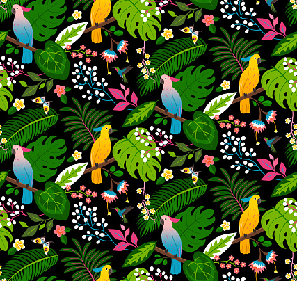 Seamless floral pattern with parrots, tropical flowers and leaves on a black background.